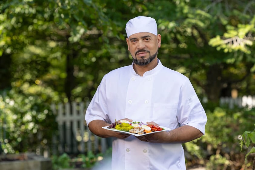 Chef holding food